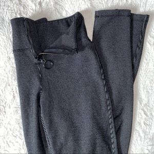 BLACK AND WHITE MICRO PINSTRIPE SKINNY ZIPPER PANTS